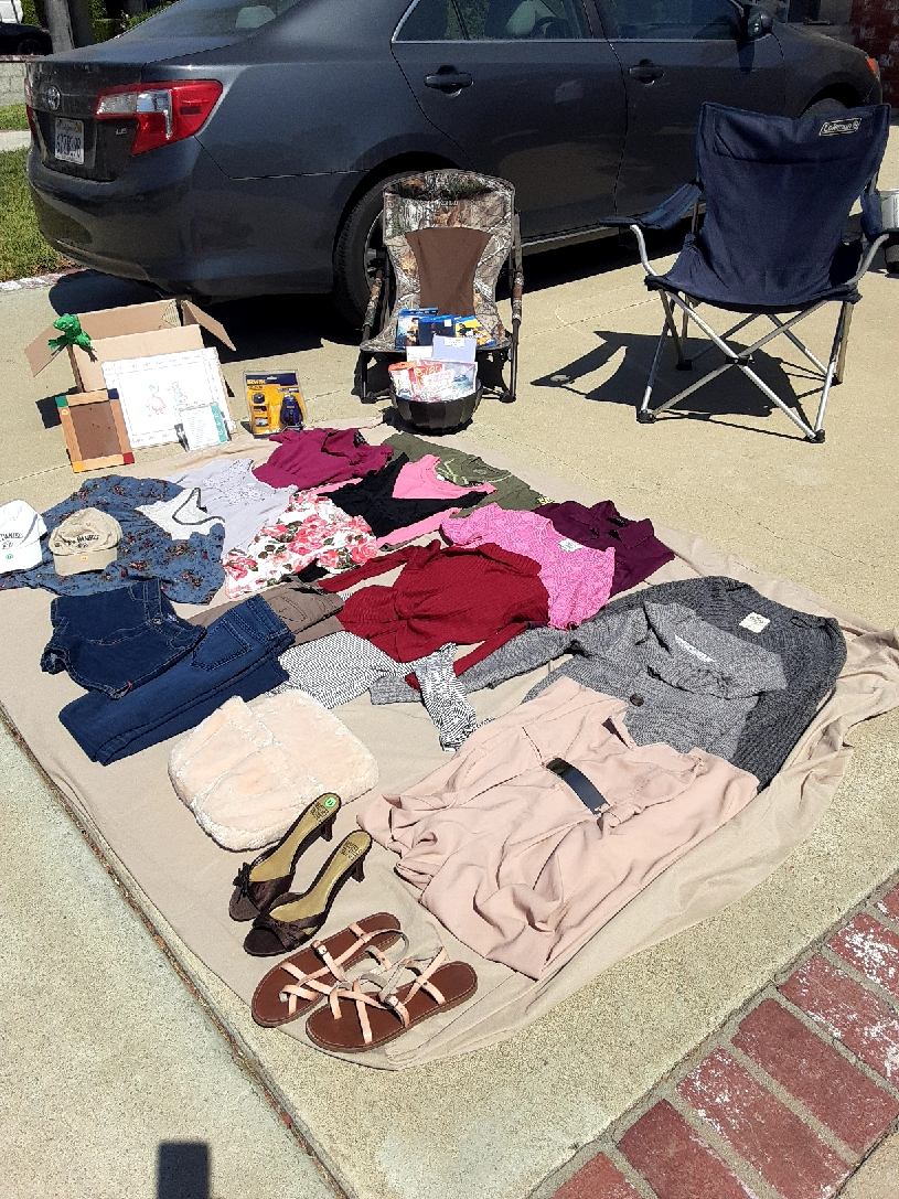 Womens name brand blouses, shorts and pants, PS4 sports games, brand new, new release blu ray dvds and a Sears 'Gamefisher' fishing boat